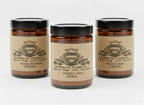 Three jars of De Beauvoir Candle Co candles on a white background